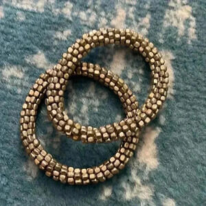 Silver hand beaded elastic stretch pair of bracelets